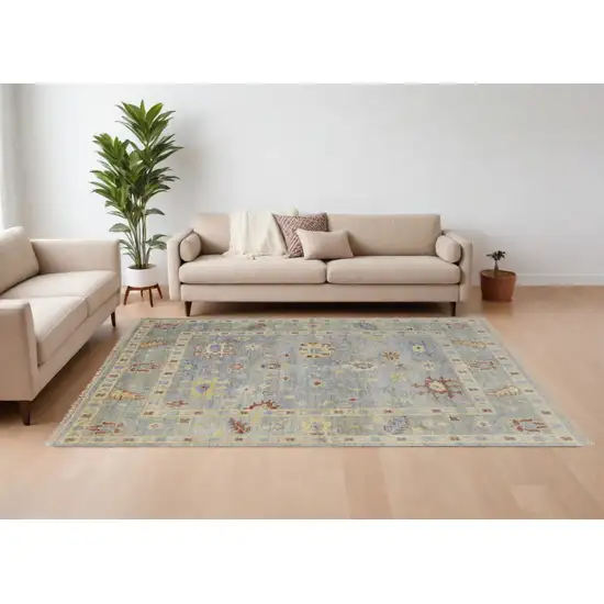Light Blue and Taupe Wool Floral Hand Knotted Area Rug With Fringe Photo 1