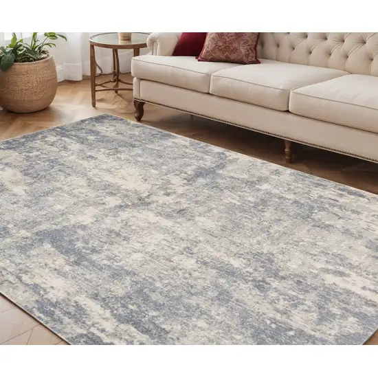Light Gray and Blue Abstract Power Loom Area Rug Photo 1