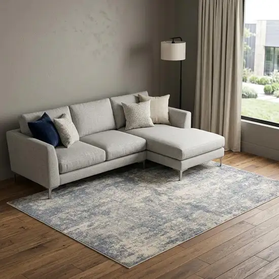 Light Gray Blue And Ivory Abstract Area Rug Photo 1
