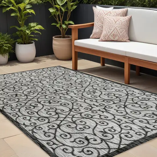Light Gray And Black Geometric Indoor Outdoor Area Rug Photo 1