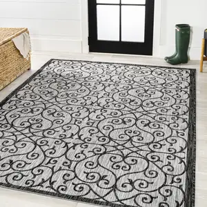 Photo of Light Gray And Black Geometric Indoor Outdoor Area Rug