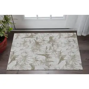 Photo of Light Gray And Brown Geometric Washable Area Rug With UV Protection