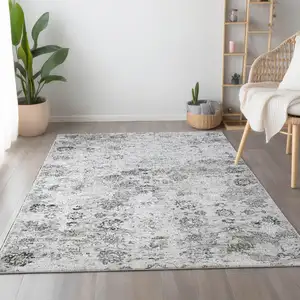 Photo of Light Gray And Charcoal Floral Medallion Washable Area Rug With UV Protection