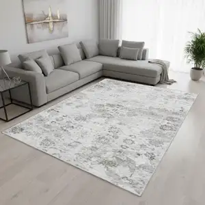 Photo of Light Gray And Charcoal Floral Medallion Washable Area Rug With UV Protection