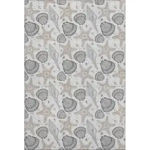 Photo of Light Gray And Charcoal Geometric Washable Area Rug With UV Protection