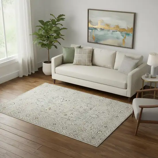 Light Gray Black And Yellow Floral Distressed Area Rug Photo 1