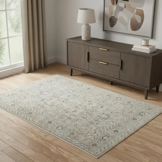 Light Gray Black And Yellow Floral Distressed Area Rug Photo 1