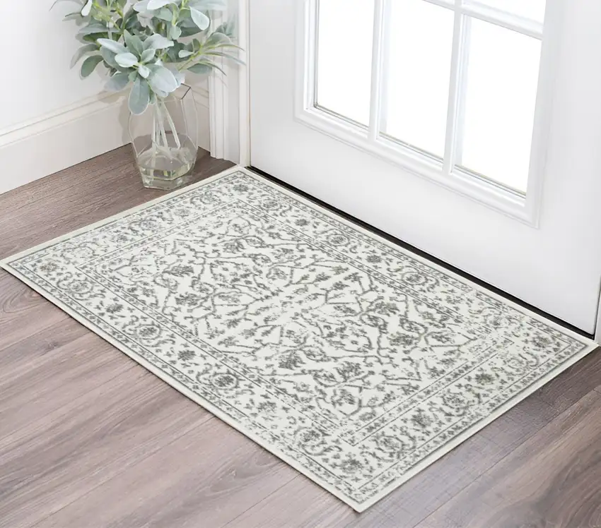 Gray and Light Gray Floral Power Loom Area Rug Photo 1