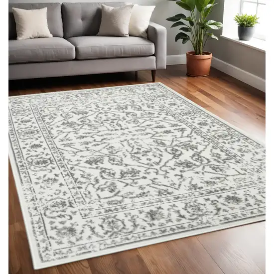 Ivory And Gray Floral Area Rug Photo 1