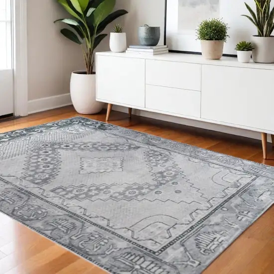 Light Gray And Charcoal Geometric Distressed Area Rug Photo 1