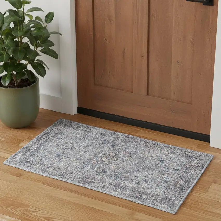 Light Grey And Blue Oriental Power Loom Distressed Washable Area Rug Photo 1