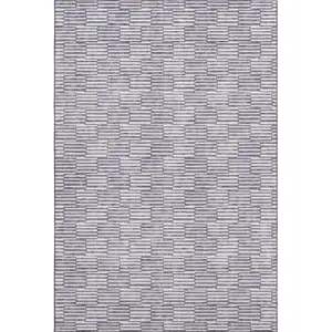 Photo of Lilac And Ivory Abstract Geometric Washable Area Rug With UV Protection