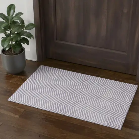Lilac And Ivory Chevron Washable Area Rug With UV Protection Photo 1