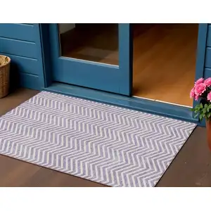 Photo of Lilac And Ivory Chevron Washable Indoor Outdoor Area Rug