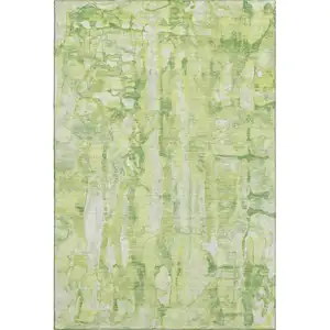 Photo of Lime Green And Ivory Abstract Washable Area Rug With UV Protection