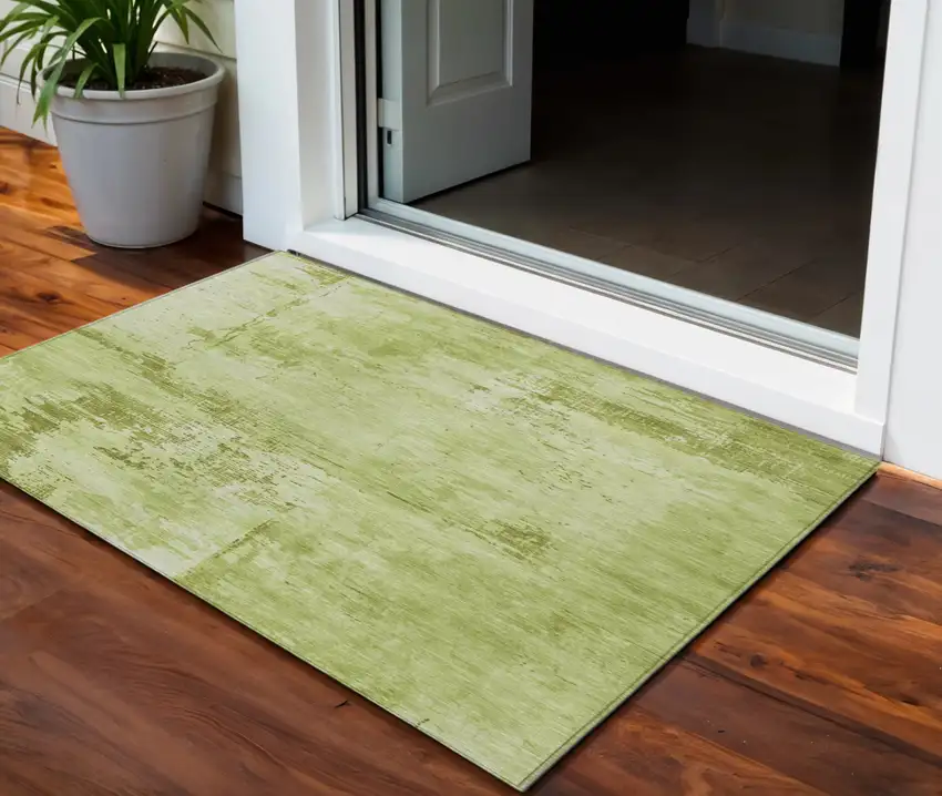 Lime Green And Ivory Abstract Washable Indoor Outdoor Area Rug Photo 1