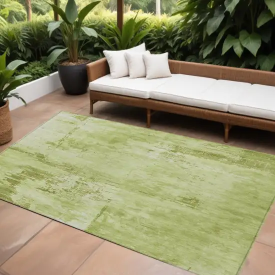 Lime Green And Ivory Abstract Washable Indoor Outdoor Area Rug Photo 1