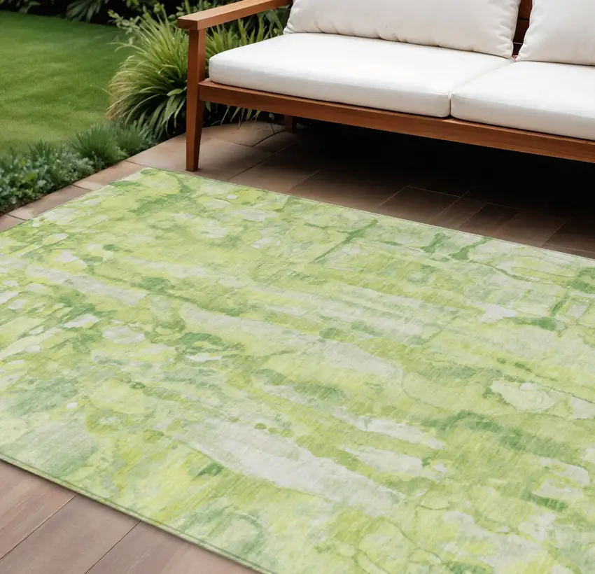 Lime Green And Ivory Abstract Washable Indoor Outdoor Area Rug Photo 1