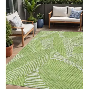 Photo of Lime Green And Ivory Floral Washable Indoor Outdoor Area Rug