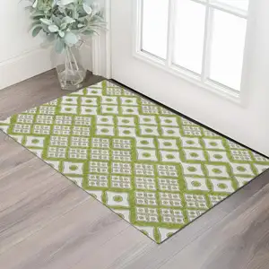 Photo of Lime Green And Ivory Geometric Washable Area Rug With UV Protection