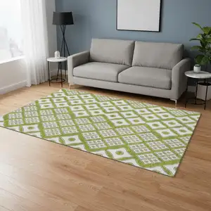 Photo of Lime Green And Ivory Geometric Washable Area Rug With UV Protection