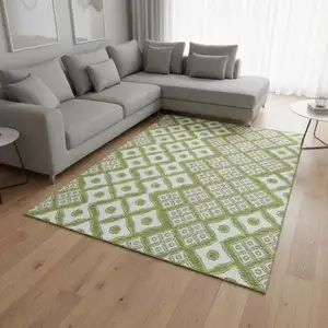 Photo of Lime Green And Ivory Geometric Washable Area Rug With UV Protection