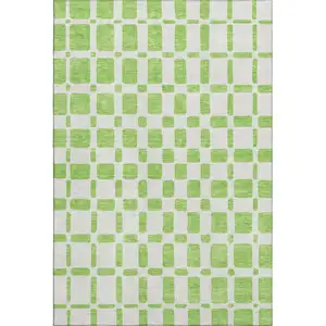 Photo of Lime Green And Ivory Geometric Washable Area Rug With UV Protection