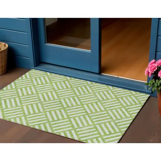 Lime Green And Ivory Geometric Washable Indoor Outdoor Area Rug Photo 1