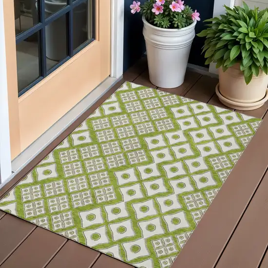 Lime Green And Ivory Geometric Washable Indoor Outdoor Area Rug Photo 1