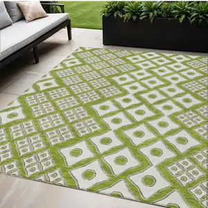 Photo of Lime Green And Ivory Geometric Washable Indoor Outdoor Area Rug