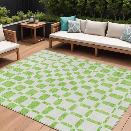 Lime Green And Ivory Geometric Washable Indoor Outdoor Area Rug Photo 1