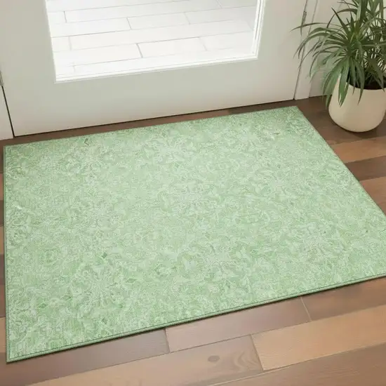 Lime Green And Ivory Medallion Washable Area Rug With UV Protection Photo 1