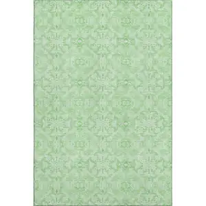 Photo of Lime Green And Ivory Medallion Washable Area Rug With UV Protection