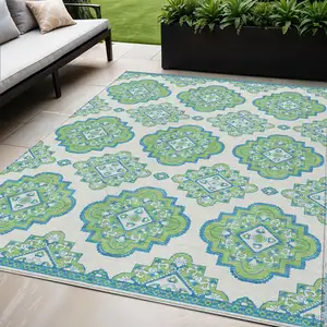 Photo of Lime Green And Ivory Medallion Washable Indoor Outdoor Area Rug