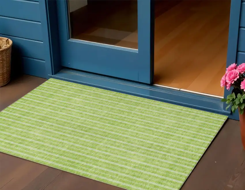 Lime Green And Ivory Striped Washable Indoor Outdoor Area Rug Photo 1