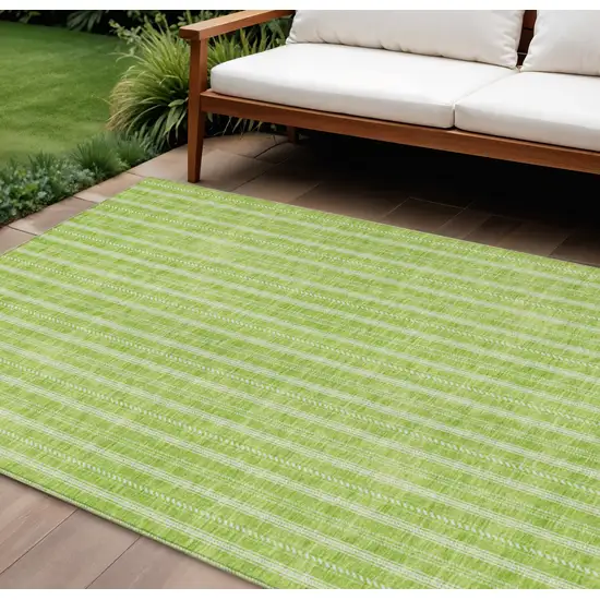 Lime Green And Ivory Striped Washable Indoor Outdoor Area Rug Photo 1