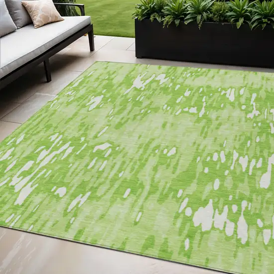 Lime Green And Ivory Striped Washable Indoor Outdoor Area Rug Photo 1