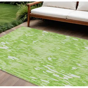 Photo of Lime Green And Ivory Striped Washable Indoor Outdoor Area Rug