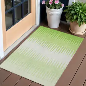 Photo of Lime Green And Ivory Striped Washable Indoor Outdoor Area Rug
