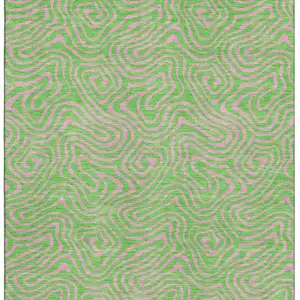 Photo of Lime Green And Pink Abstract Washable Area Rug With UV Protection