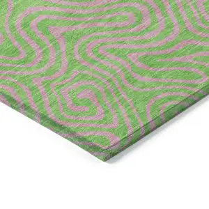 Photo of Lime Green And Pink Abstract Washable Indoor Outdoor Area Rug