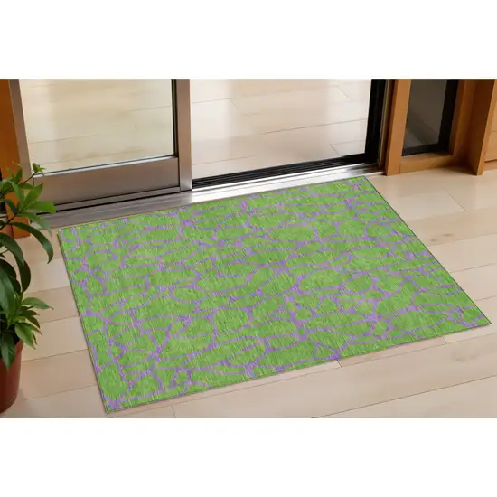 Lime Green And Purple Geometric Washable Indoor Outdoor Area Rug Photo 1