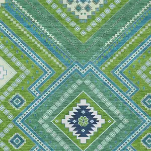 Photo of Lime Green Aqua And Ivory Tribal Washable Indoor Outdoor Area Rug