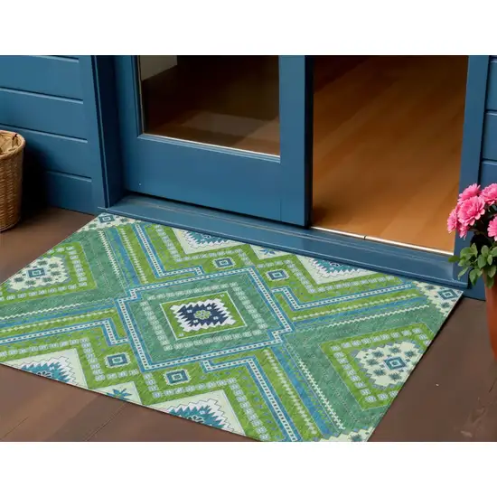 Lime Green Aqua And Ivory Tribal Washable Indoor Outdoor Area Rug Photo 1