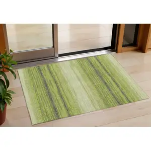 Photo of Lime Green Ivory And Black Striped Washable Indoor Outdoor Area Rug