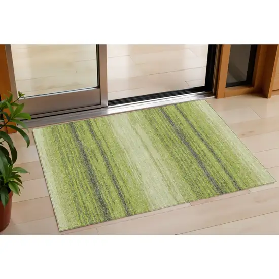 Lime Green Ivory And Black Striped Washable Indoor Outdoor Area Rug Photo 1