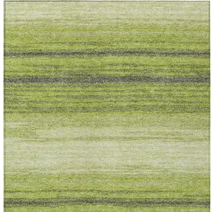 Photo of Lime Green Ivory And Black Striped Washable Indoor Outdoor Area Rug