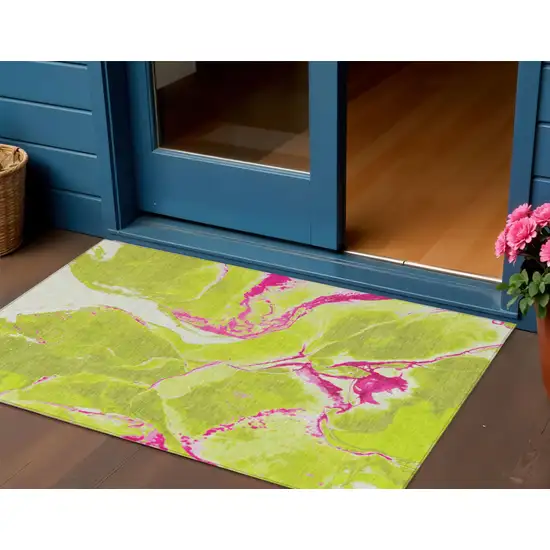 Lime Green Neon Pink And Ivory Abstract Washable Indoor Outdoor Area Rug Photo 1