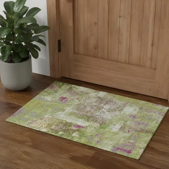 Lime Green Pink And Yellow Abstract Washable Area Rug With UV Protection Photo 1