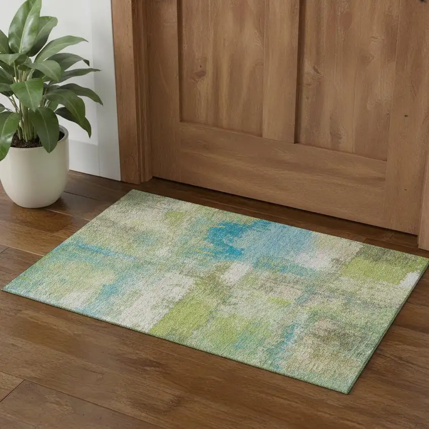Lime Green Teal And Ivory Abstract Washable Area Rug With UV Protection Photo 1
